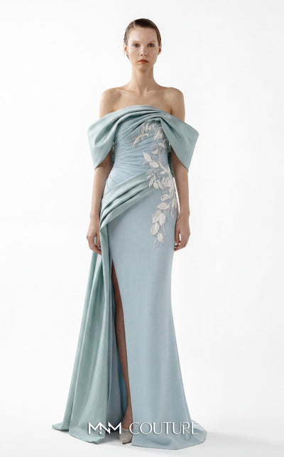 MNM Couture Style G2007 showcasing a cream crepe gown with dramatic off-shoulder satin sleeves, exquisite handmade embroidery on the bodice, and subtle thigh-high slit | Couture Shop LA