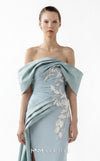 MNM Couture Style G2007 showcasing a cream crepe gown with dramatic off-shoulder satin sleeves, exquisite handmade embroidery on the bodice, and subtle thigh-high slit | Couture Shop LA
