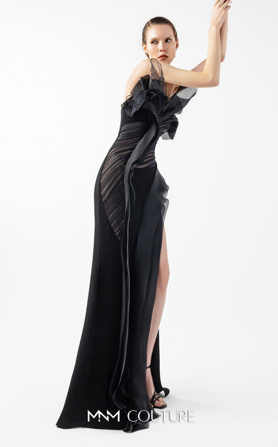 MNM Couture Style G2010 showcasing a black crepe gown with a sculpted bust of organza, Chantilly lace, draped tulle, and a daring high front slit. | Couture Shop LA