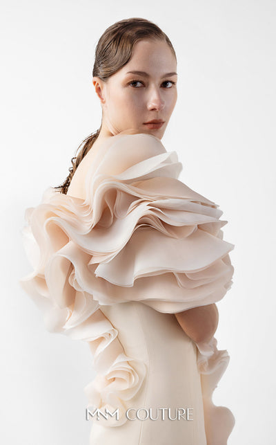 MNM Couture Style G2013 showcasing a cream crepe gown with voluminous cascading peach organza ruffles and a sculpted high front slit framed by fluid folds | Couture Shop LA