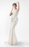 MNM Couture Style G2015 showcasing a cream strapless mermaid gown with pearl lace bodice detailing and sculptural organza inserts blooming at the hip | Couture Shop LA
