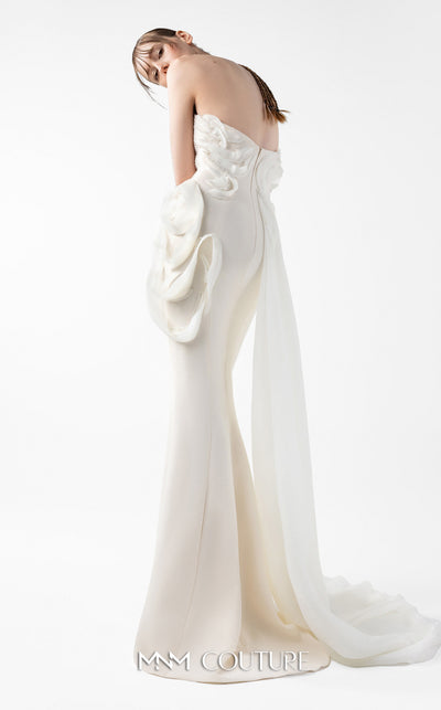 MNM Couture Style G2015 showcasing a cream strapless mermaid gown with pearl lace bodice detailing and sculptural organza inserts blooming at the hip | Couture Shop LA