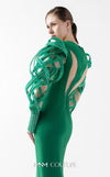 MNM Couture Style G2017 showcasing an emerald green crepe mermaid gown with mesmerizing illusion sleeves featuring intricate lace and ethereal organza inserts