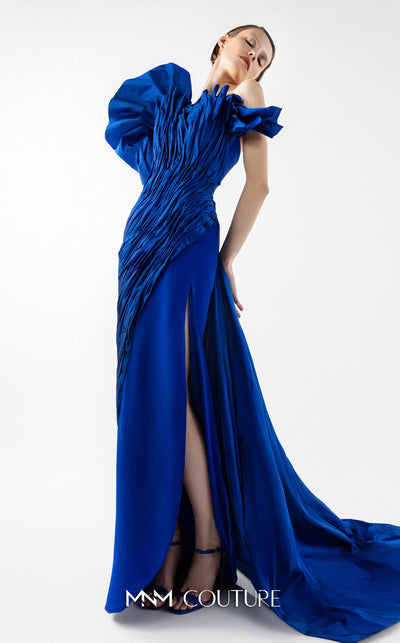 MNM Couture Style G2019 showcasing a royal blue strapless gown with sculptural taffeta draping cascading from bustline to hem, featuring architectural design and dramatic side train | Couture Shop LA