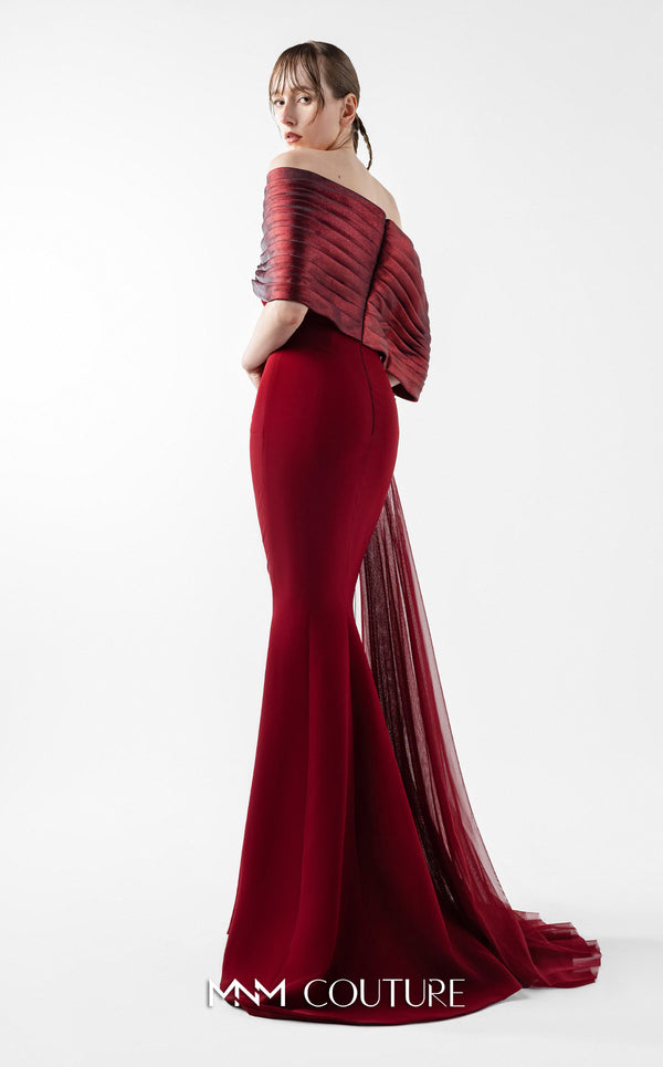 MNM Couture Style G2022 showcasing a burgundy mermaid gown with pleated lamé organza shoulders, intricate embroidery, and a tulle train | Couture Shop LA