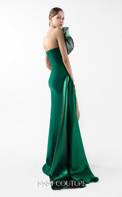 MNM Couture Style G2023 emerald green evening dress with column-fitted silhouette, asymmetric neckline, side slit, and cascading train, exuding luxury | Couture Shop LA