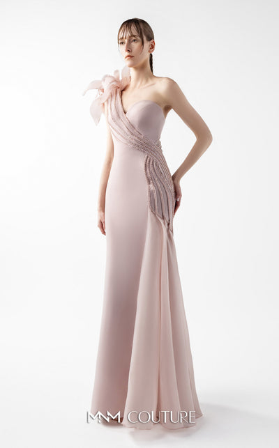 MNM Couture Style G2026 showcasing a blush crepe gown with organza floral accent, lace embellishments, and a side train | Couture Shop LA
