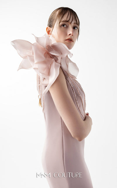 MNM Couture Style G2026 showcasing a blush crepe gown with organza floral accent, lace embellishments, and a side train | Couture Shop LA