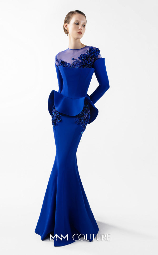 MNM Couture Style G2029 showcasing a royal blue mermaid crepe gown with illusion tulle neckline, intricate hand embroidery, long sleeves, and peplum waist detail | Couture Shop LA