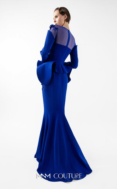 MNM Couture Style G2029 showcasing a royal blue mermaid crepe gown with illusion tulle neckline, intricate hand embroidery, long sleeves, and peplum waist detail | Couture Shop LA