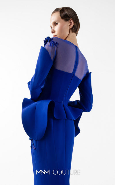 MNM Couture Style G2029 showcasing a royal blue mermaid crepe gown with illusion tulle neckline, intricate hand embroidery, long sleeves, and peplum waist detail | Couture Shop LA