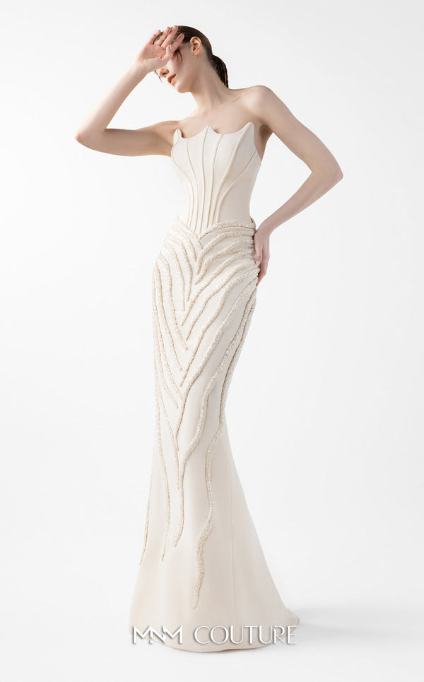 MNM Couture Style G2032 showcasing a cream mermaid gown with three-angular corseted neckline, fitted silhouette, and intricate ribbed lace textural detailing throughout the skirt | Couture Shop LA