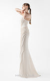 MNM Couture Style G2032 showcasing a cream mermaid gown with three-angular corseted neckline, fitted silhouette, and intricate ribbed lace textural detailing throughout the skirt | Couture Shop LA