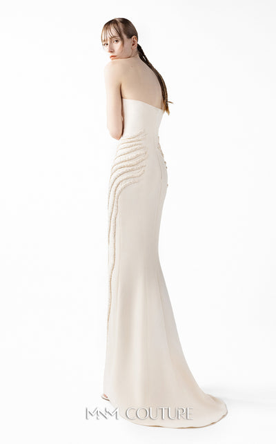 MNM Couture Style G2032 showcasing a cream mermaid gown with three-angular corseted neckline, fitted silhouette, and intricate ribbed lace textural detailing throughout the skirt | Couture Shop LA