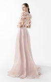 MNM Couture Style G2035 showcasing a blush pink gown with sheer illusion bodice, long sleeves adorned with 3D floral appliques, lace inserts, and flowing envelope skirt | Couture Shop LA