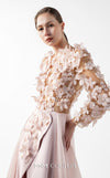 MNM Couture Style G2035 showcasing a blush pink gown with sheer illusion bodice, long sleeves adorned with 3D floral appliques, lace inserts, and flowing envelope skirt | Couture Shop LA