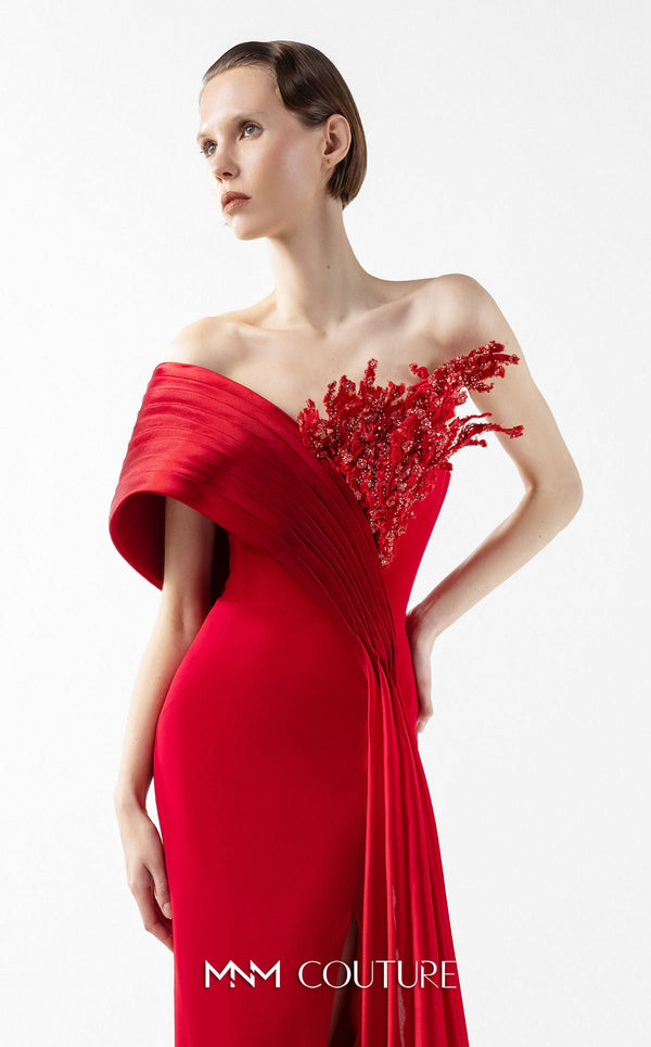MNM Couture Style G2040 showcasing a scarlet red off-shoulder crepe gown with a pleated organza panel, hand-embellished bust, high slit, and a fluid train. | Couture Shop LA
