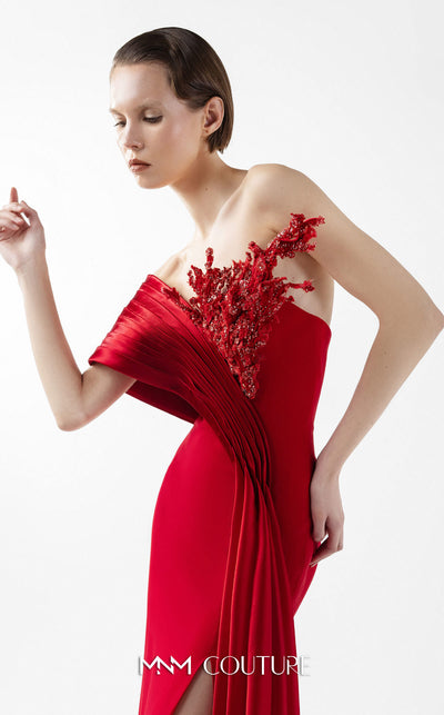 MNM Couture Style G2040 showcasing a scarlet red off-shoulder crepe gown with a pleated organza panel, hand-embellished bust, high slit, and a fluid train. | Couture Shop LA