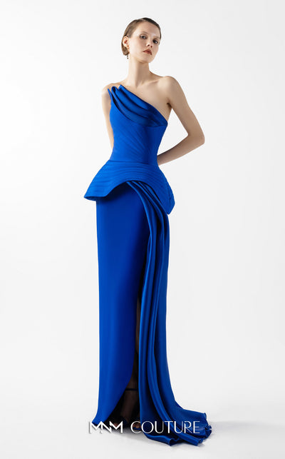 MNM Couture Style G2044 showcasing a royal blue one-shoulder crepe gown with a structured peplum, folded organza drapes, a high slit, and a side train. | Couture Shop LA