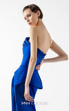 MNM Couture Style G2044 showcasing a royal blue one-shoulder crepe gown with a structured peplum, folded organza drapes, a high slit, and a side train. | Couture Shop LA