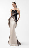 MNM Couture Style G2045 showcasing a strapless dual-tone gown in cream and anthracite, featuring a sculpted hip design and floral appliqué on the bodice. | Couture Shop LA