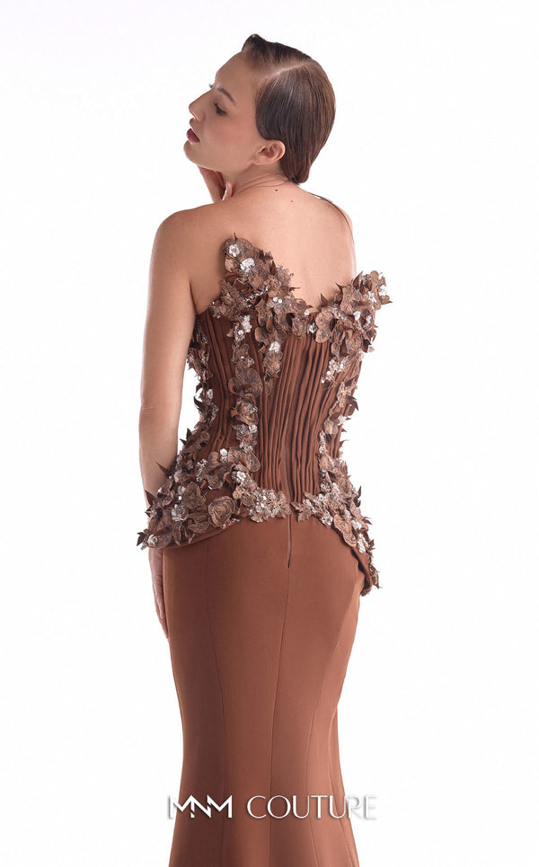Brown plunging V corset evening gown MNM Couture Style G2108 adorned with 3D floral appliqué, precise pleating, and a high-slit crepe skirt