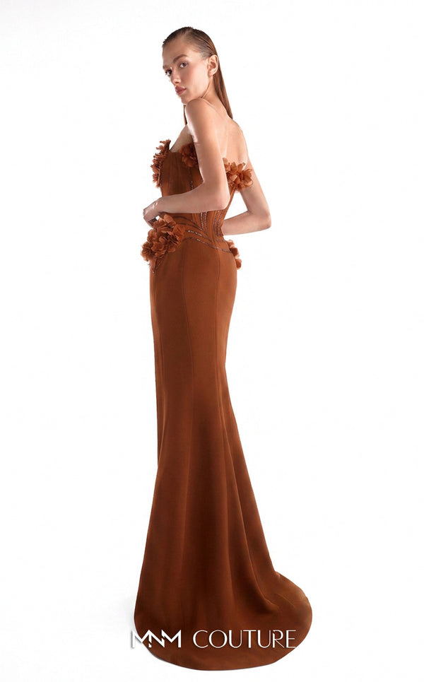 Black strapless mermaid gown MNM Couture Style G2115 with a sculpted sequin heart-shaped corset and handcrafted 3D floral appliqués