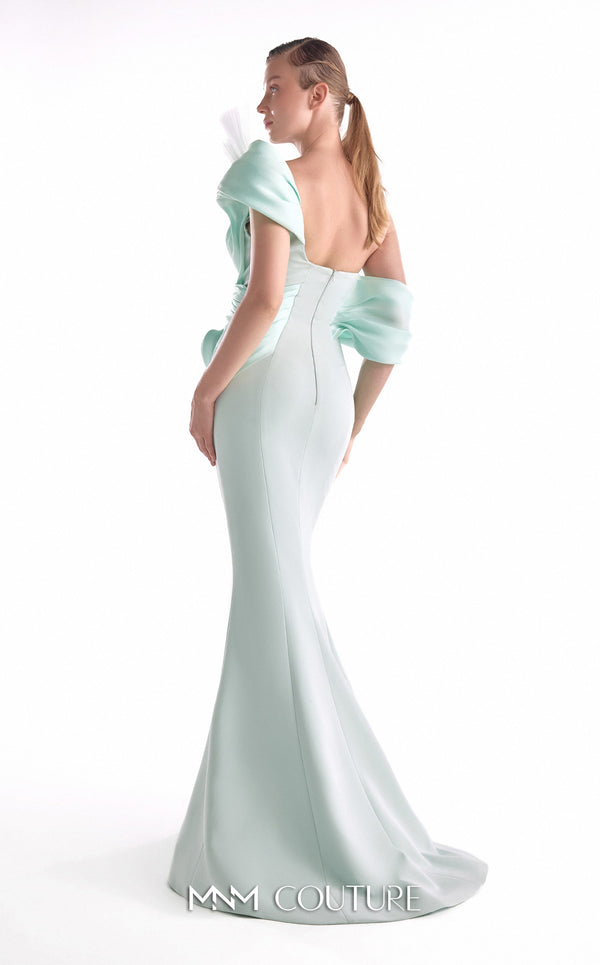 Mint green mermaid gown MNM Couture Style G2136 featuring fluid organza draping, artful bodice pleats, and a soft off-shoulder neckline