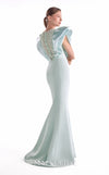 Mint crepe mermaid gown MNM Couture Style G2138 adorned with voluminous organza shoulders and cascading pearl drapery over a sheer illusion panel