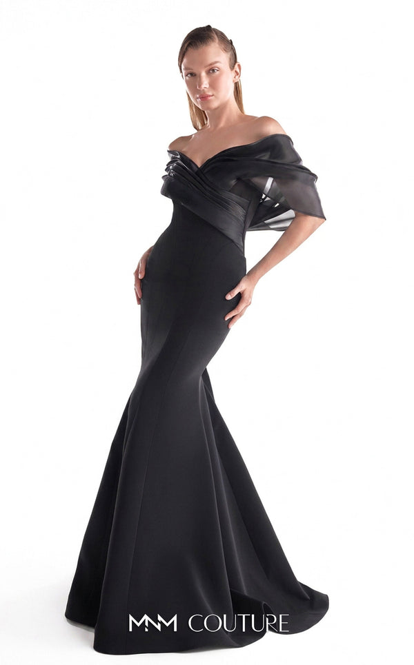 Navy crepe mermaid gown MNM Couture Style G2144 featuring an off-shoulder neckline with gracefully draped midnight blue liquid organza