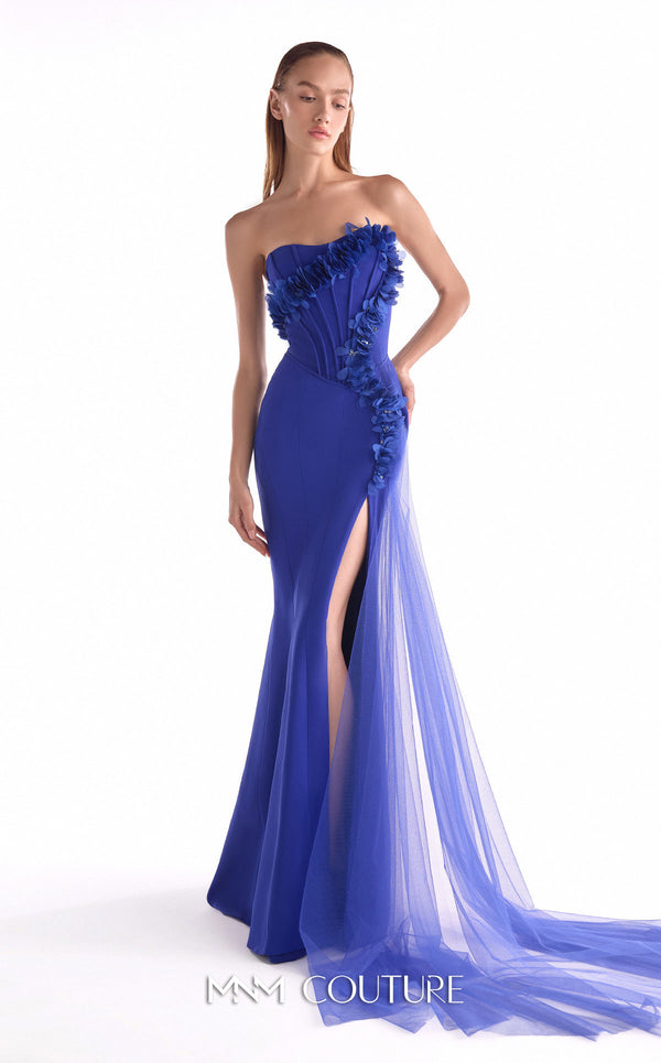 Royal blue crepe gown MNM Couture Style G2149 with a boned strapless corset bodice, floral appliqués, and a flowing tulle train