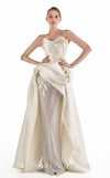 MNM Couture G2201 ivory organza and crystal mesh fitted column gown with strapless sweetheart neckline, hand-draped bodice, embroidered waist, and asymmetrical sculptural overskirt with cathedral train | Couture Shop LA.
