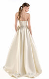 MNM Couture G2201 ivory organza and crystal mesh fitted column gown with strapless sweetheart neckline, hand-draped bodice, embroidered waist, and asymmetrical sculptural overskirt with cathedral train | Couture Shop LA.