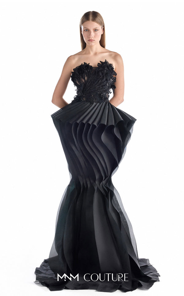 MNM Couture G2205 black organza and beaded lace mermaid gown with strapless illusion corset, hand-beaded floral lace appliqués, and sculptural pleated organza waves with train | Couture Shop LA.