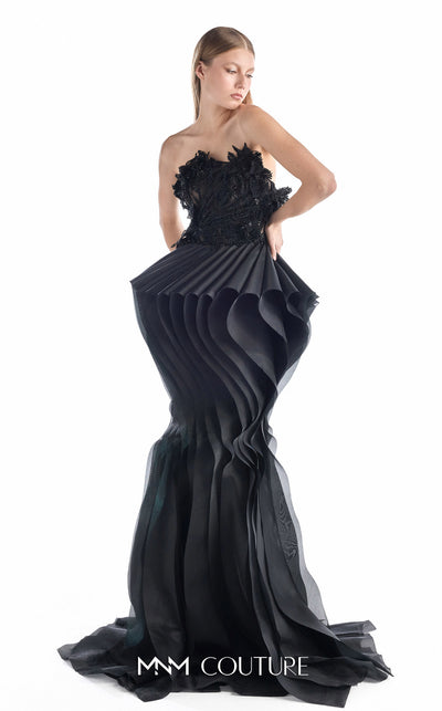 MNM Couture G2205 black organza and beaded lace mermaid gown with strapless illusion corset, hand-beaded floral lace appliqués, and sculptural pleated organza waves with train | Couture Shop LA.