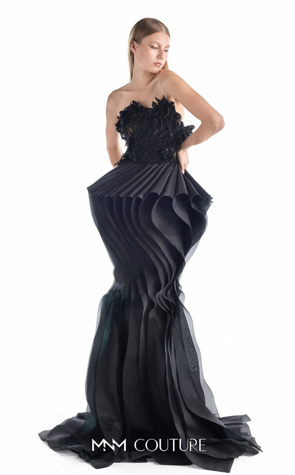MNM Couture G2205 black organza and beaded lace mermaid gown with strapless illusion corset, hand-beaded floral lace appliqués, and sculptural pleated organza waves with train | Couture Shop LA.