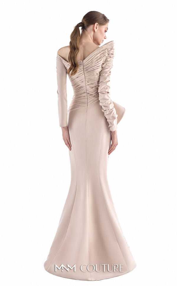 MNM Couture G2216 nude crepe and beaded sequin column gown with asymmetrical off-shoulder neckline, ruched long sleeves, architectural peplum, and beaded sequin panel | Couture Shop LA.