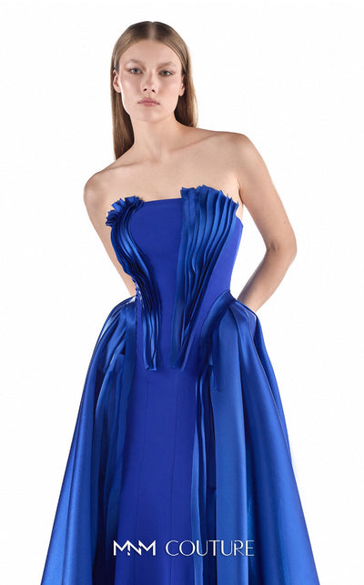 MNM Couture G2225 sapphire crepe and satin organza strapless straight column gown with sculptural pleated satin organza bodice and detachable overskirt with floor-length train | Couture Shop LA.