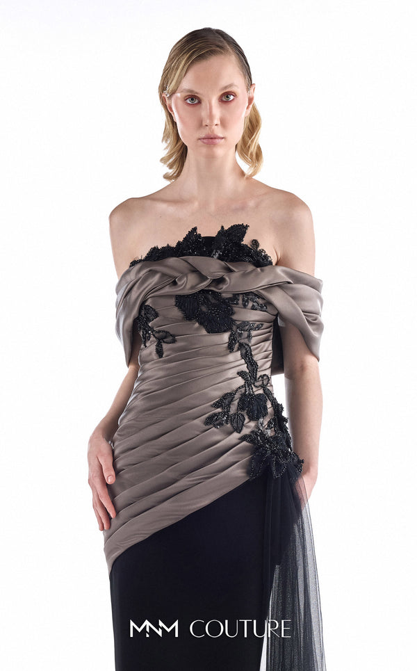 MNM Couture G2228 black crepe, mikado, and beaded black lace off-the-shoulder mermaid gown with sculptural draping and sheer tulle side cascade | Couture Shop LA.