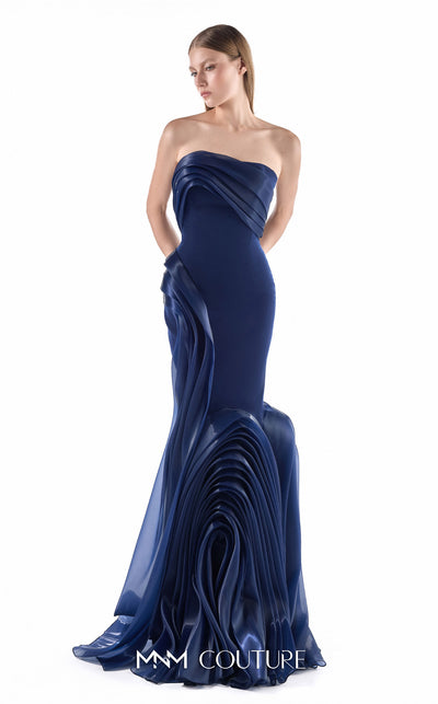 MNM Couture G2230 navy crepe and liquid organza strapless slim mermaid gown with sculptural wave-inspired draping and flowing organza train | Couture Shop LA.