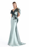 MNM Couture G2240 mint crepe, beaded lace, and liquid organza plunging off-shoulder mermaid gown with cascading organza waves, hand-applied beaded lace waist, and flowing organza train | Couture Shop LA.