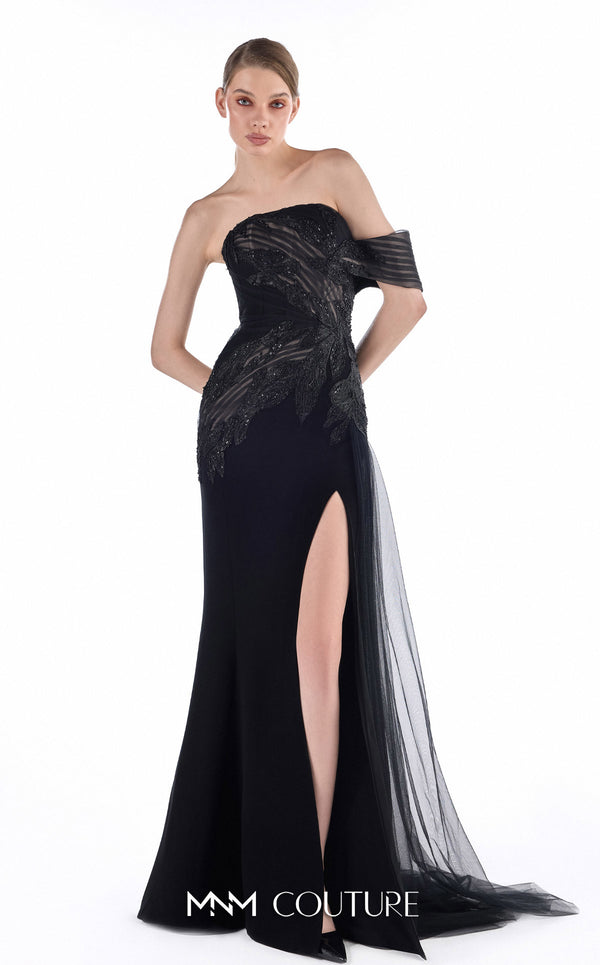 MNM Couture G2246 black beaded lace, crepe, and tulle off-shoulder sheath gown with sheer striped tulle detail, thigh-high front slit, and soft tulle train | Couture Shop LA.