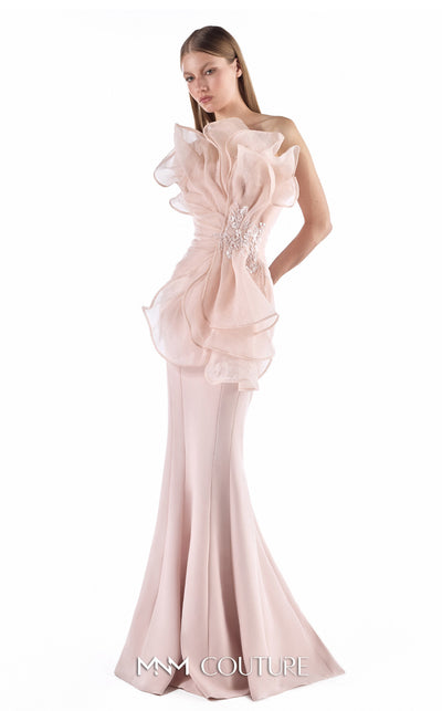 MNM Couture G2247 blush crepe and organza one-shoulder ruffled mermaid gown with sculptural cascading organza ruffles, hand-embroidered lace inserts at the waist, and elegant train | Couture Shop LA.
