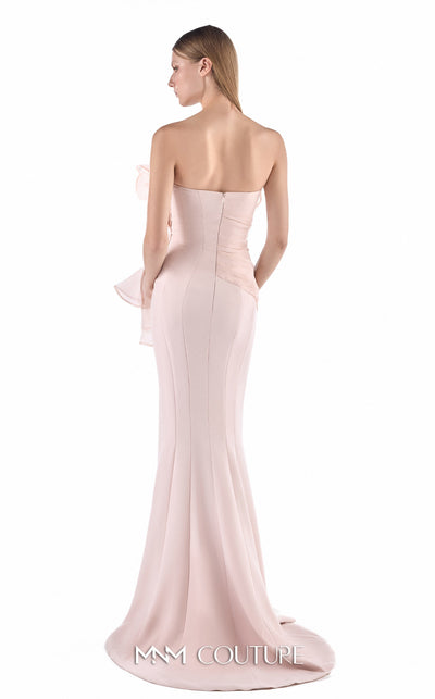 MNM Couture G2247 blush crepe and organza one-shoulder ruffled mermaid gown with sculptural cascading organza ruffles, hand-embroidered lace inserts at the waist, and elegant train | Couture Shop LA.