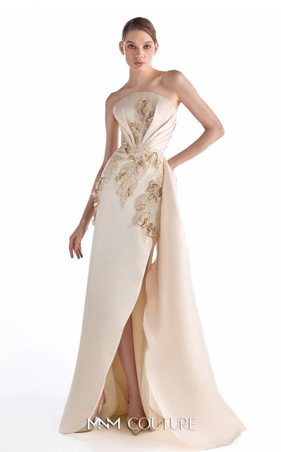 MNM Couture G2248 champagne crepe, lace, and crystal organza strapless column gown with sculpted bodice, hand-embroidered lace appliqués, draped crystal organza side panel, front slit, and sweeping train | Couture Shop LA.