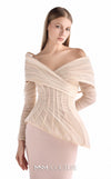 MNM Couture G2249 blush crepe and tulle off-the-shoulder column gown with sculpted corset bodice, layered tulle draping, asymmetrical peplum, sheer fitted long sleeves, and soft train | Couture Shop LA.