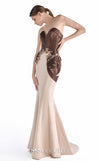 MNM Couture G2253 nude and cocoa crepe, liquid organza, and lace strapless sweetheart fitted mermaid gown with sculptural liquid organza draping, hand-applied lace appliqué, and asymmetrical hip detail | Couture Shop LA.