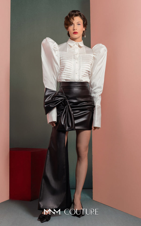 MNM Couture GOF2502 two-piece ensemble in coral mikado piqué, featuring a structured asymmetrical peplum blazer and matching high-waisted, wide-leg pants. | Couture Shop LA
