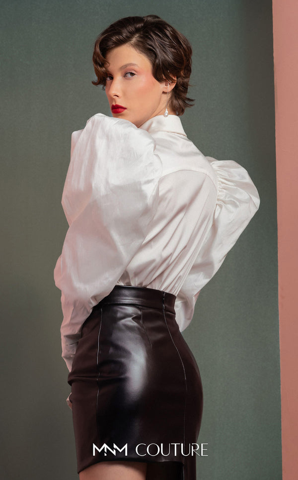 MNM Couture GOF2502 two-piece ensemble in coral mikado piqu�, featuring a structured asymmetrical peplum blazer and matching high-waisted, wide-leg pants. | Couture Shop LA