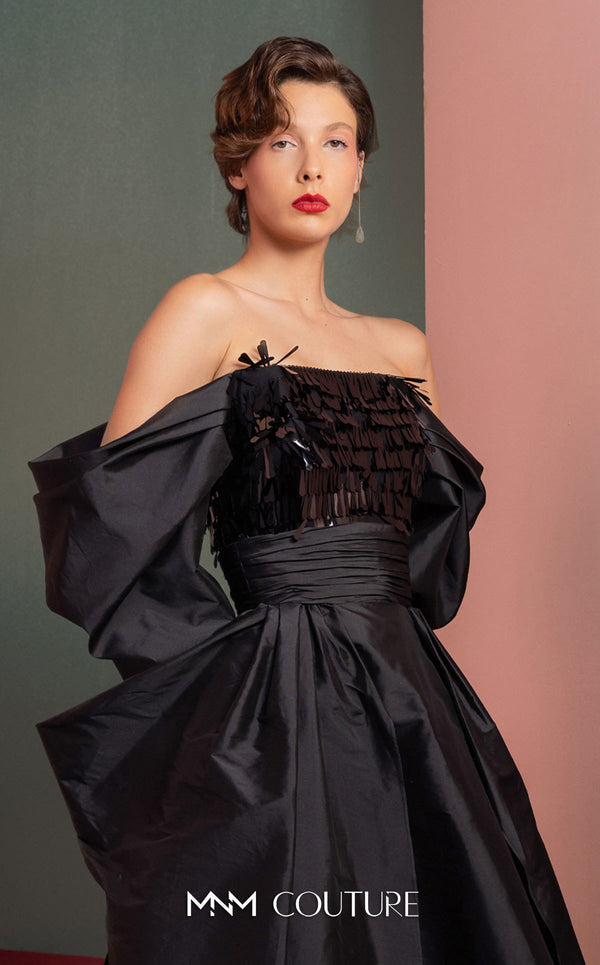 MNM Couture GOF2506 ball gown with a ruched strapless bodice and a voluminous full-length skirt crafted from layers of silver taffeta and delicate tulle. | Couture Shop LA